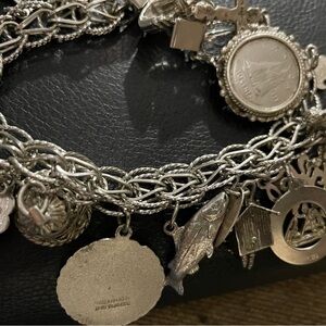 Vintage-Inspired Silver Charm Bracelet with Intricate Chain